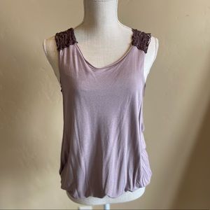 Free People slouchy tank with sheer lace back.